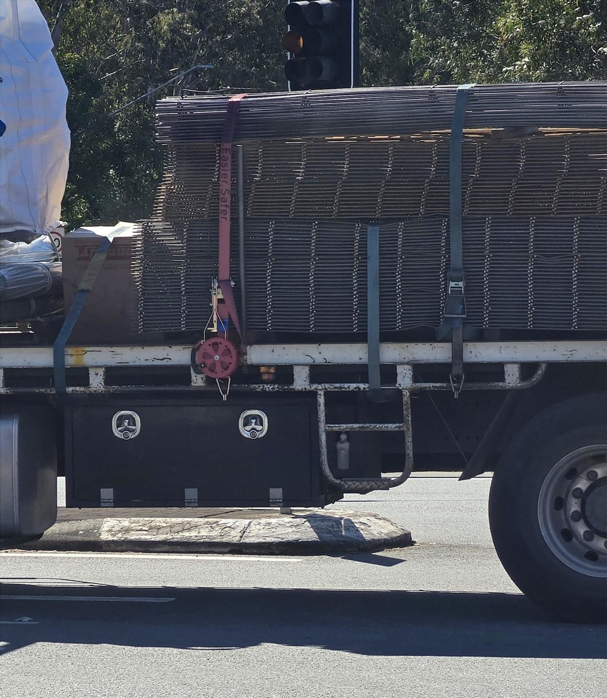 Race Reels load restraint system in use on a reinforcing mesh delivery truck
